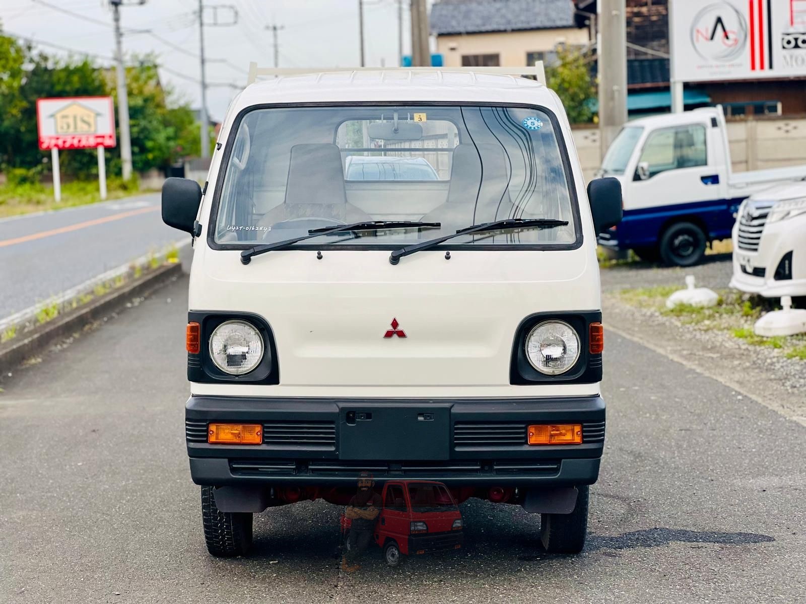 1993 Mitsubishi Minicab Dump Truck photo 2