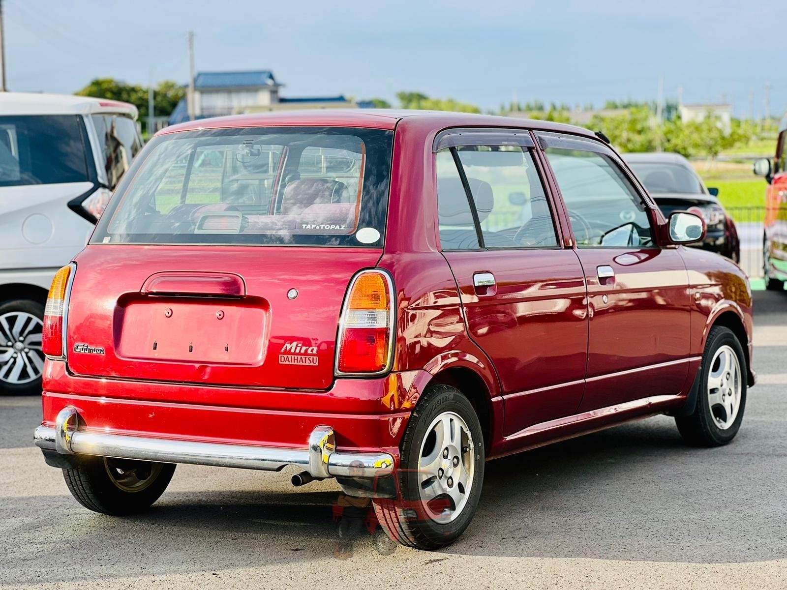 1999 Daihatsu Mira photo 6
